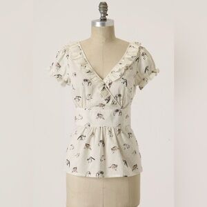 Anthropologie, Raccoon 🦝 Rumpus blouse by Rebekah Maysles. Size 6